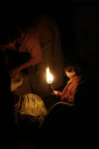 A girl looks for grains in a remote village of the Darjeeling hills