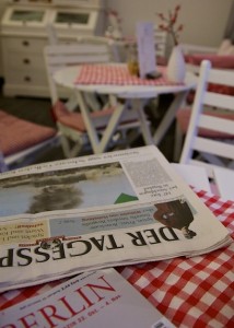 German newspapers on a cafe table
